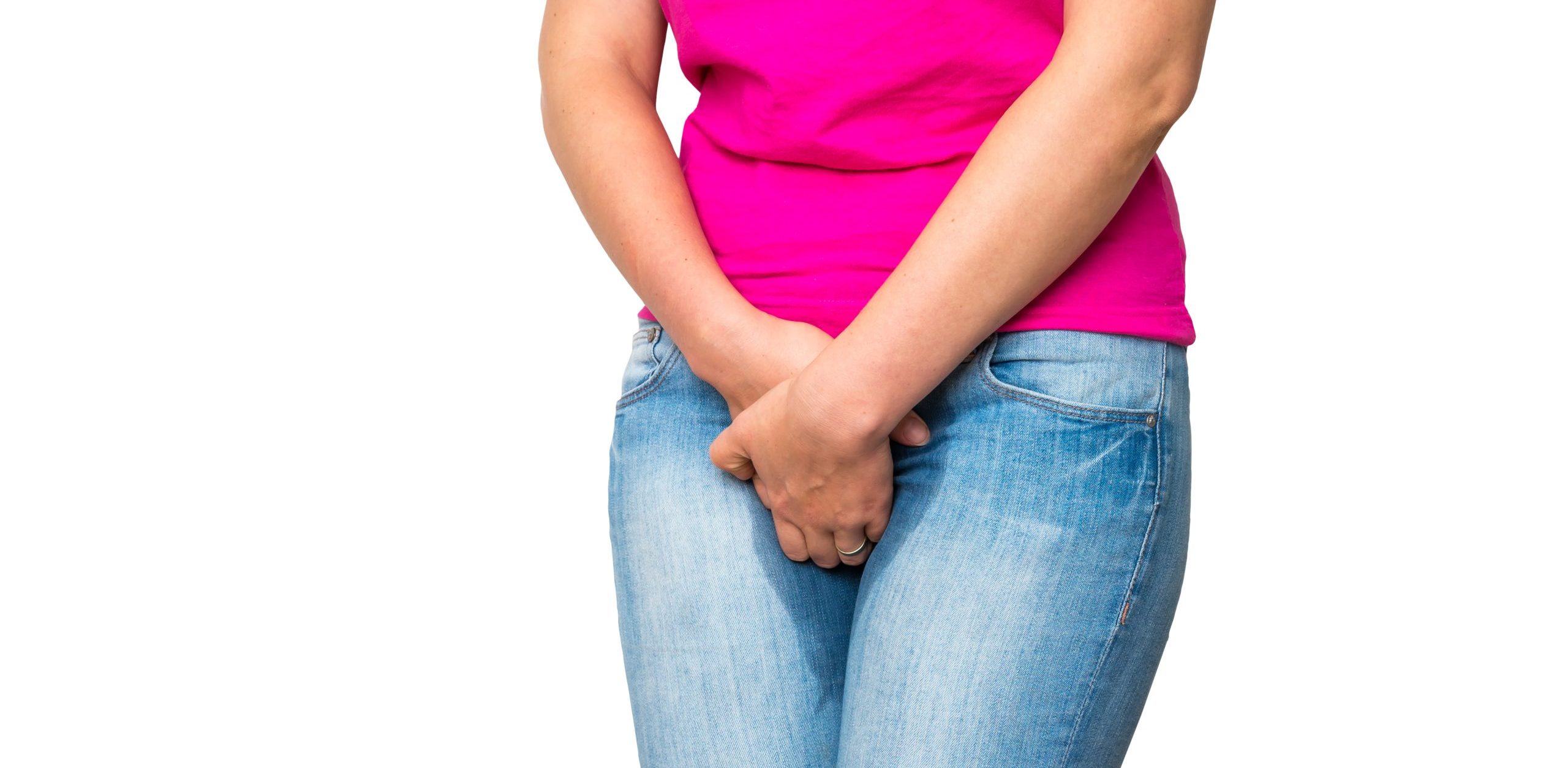 Woman with hands holding her crotch - incontinence concept