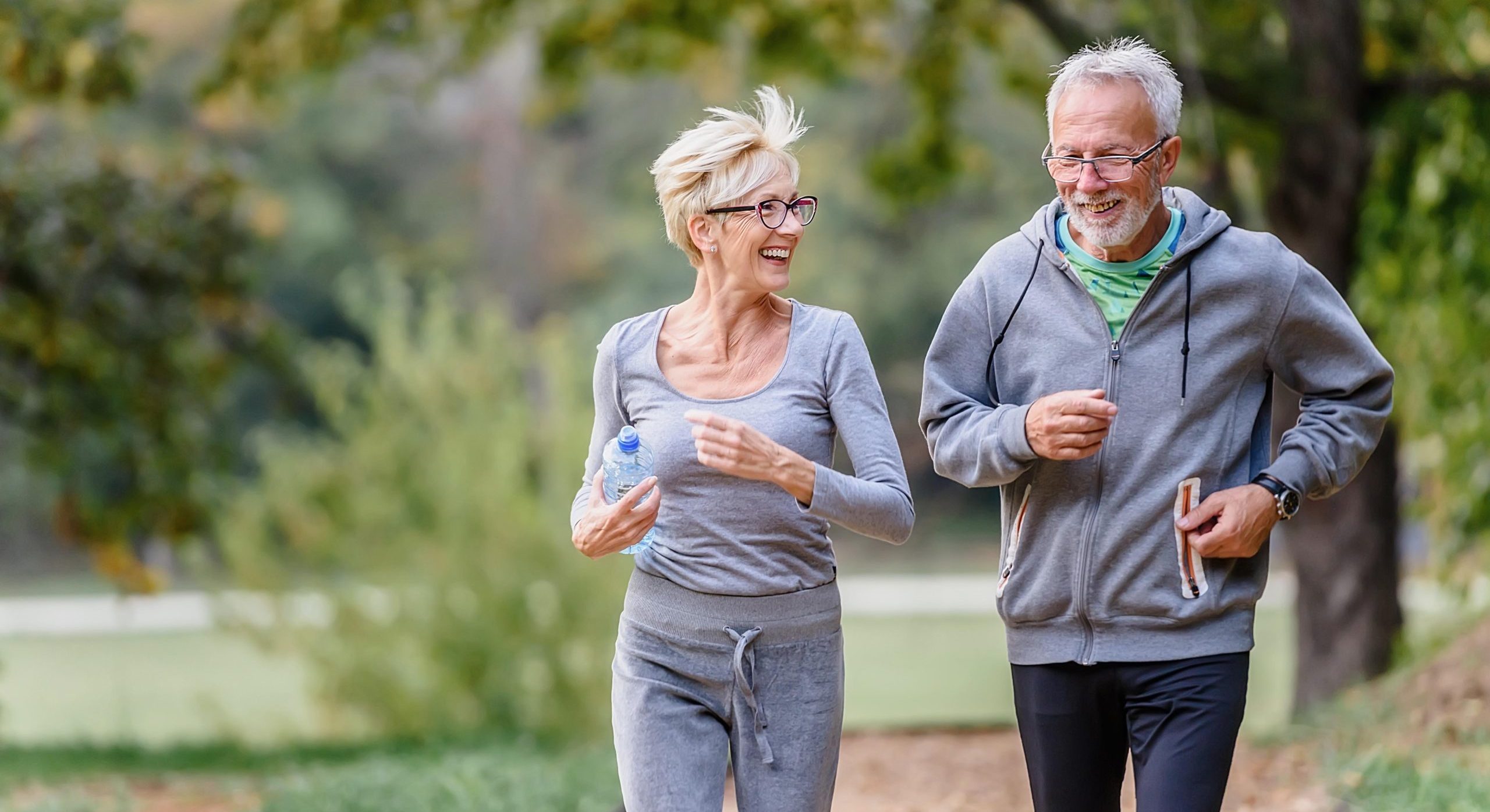 Cheerful,Active,Senior,Couple,Exercising,In,The,Park,Together.,Exercise